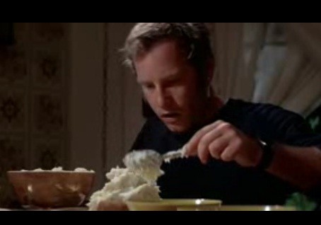 Still from Close Encounters of the Third Kind (1977)
Richard Dreyfus is sculpting a model of Devil's Tower from mashed potatoes.