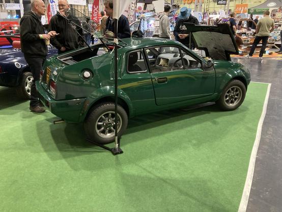 Green Mini Midas Mk2 coupé, side/rear view