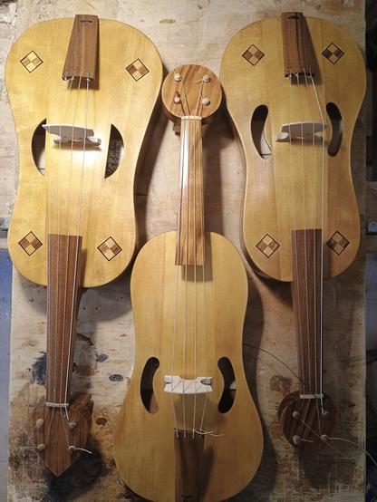 Three medieval fiddles, two with inlays in the soundboard