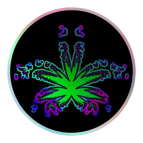 A holographic sticker in a circle shape with weird cannabis leaf art that I created in shades of green, purple, pink, and blue. The background of the art is black.