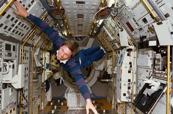 spacelab compartment where astronaut Walter sways without gravity