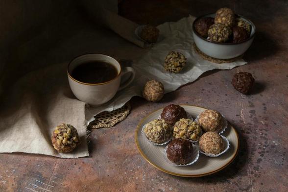chocolate balls and coffee on the table