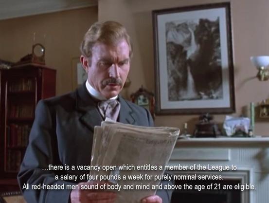 A man in a Victorian suit reading aloud from a newspaper. “…there is a vacancy open which entitles a member of the League to a salary of four pounds a week for purely nominal services. All red-headed men sound of body and mind and above the age of 21 are eligible.”