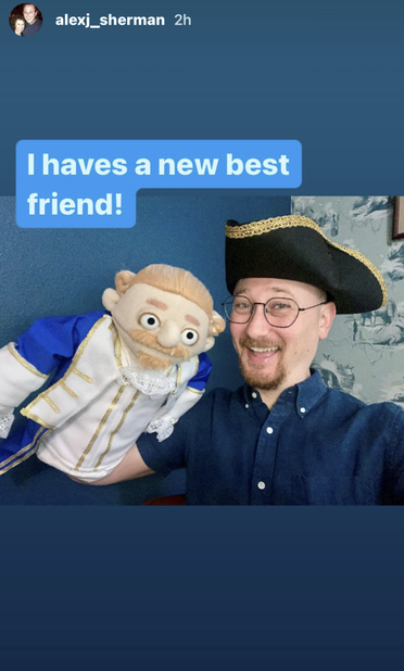 Another one of Alex's Instagram Stories: a selfie of him holding the muppet Fyre sent him. Alex is wearing a tricorn hat and laughing at the camera. Text above the photo reads, “I haves a new best friend!”