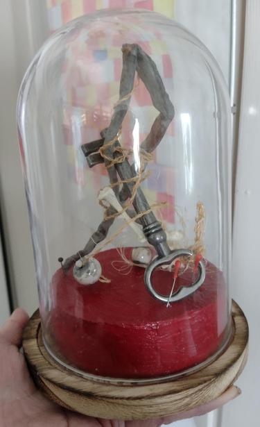 Assemblage consisting of found objects, driftwood, bone, raku pearls and natural fibre cordage.