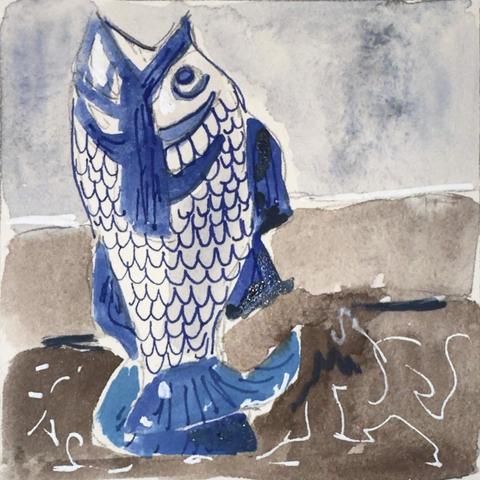 A blue and white ceramic fish that is standing on its tail. It's mouth is open.