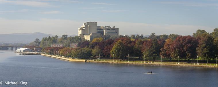 Autumn colours on Lake Burley Griffin with rowers in the foreground