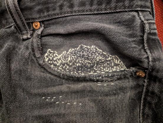 A close-up of a part I'm particularly fond of, with the suggestion of a mountain range in sashiko