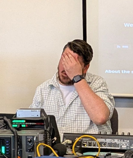 Chris from the Linux unplugged podcast face palming