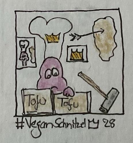 A cartoon character wearing a chef’s hat and looking exhausted/miserable. In front of him (on a table?) there’s two boxes of tofu and a hammer. Behind him on the wall, there’s two pictures hanging, a smiling chef with a schnitzel-like shape next to him and a crown. The crown is also depicted on the character’s chef’s hat. To the side, a schnitzel-like shape is pinned to the wall, with an arrow.