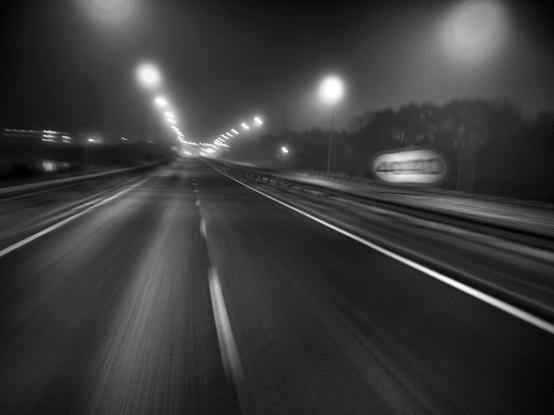 The early morning drive to work along a deserted motorway