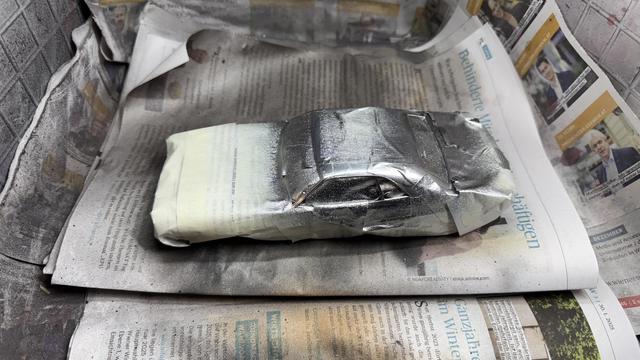 Masked and chrome sprayed body of a 1970s Dodge Challenger by Revell in 1:24