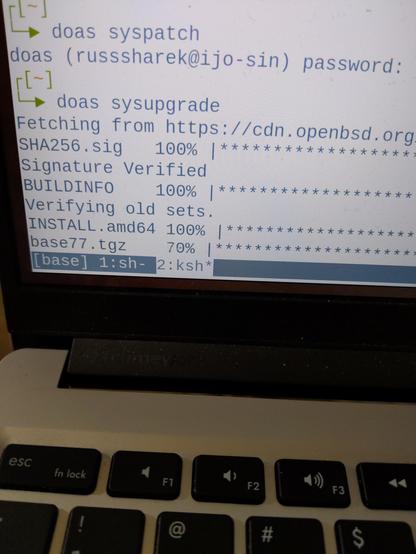 A photo of my terminal, running the sysupgrade command. On OpenBSD, this upgrades the operating system to the new release.