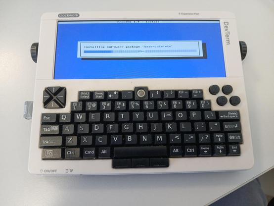 An Raspberry Pi powered "DevTerm" is showing the install screen of FreeDOS 1.4