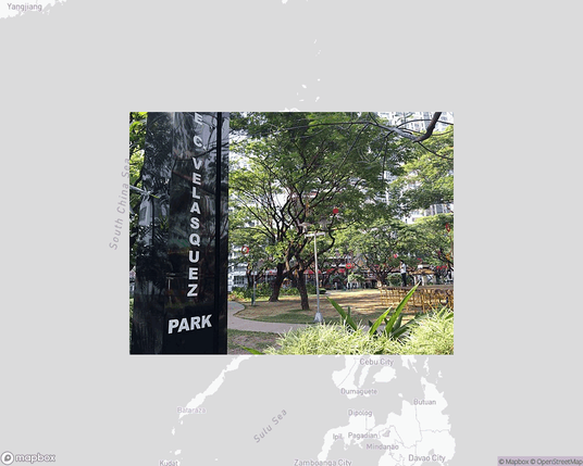 A photo of or from a park from the linked website, overlaid on a cropped world map where it's located.