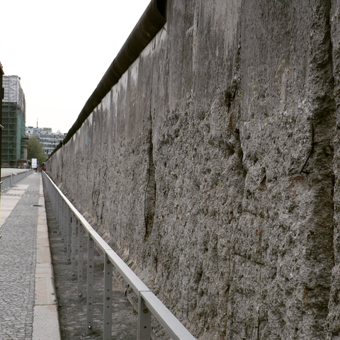 a section of the Berlin Wall, still standing though showing its age