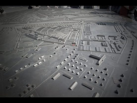 bronze aerial view relief map of Sachsenhausen, showing the layout and extent of its buildings