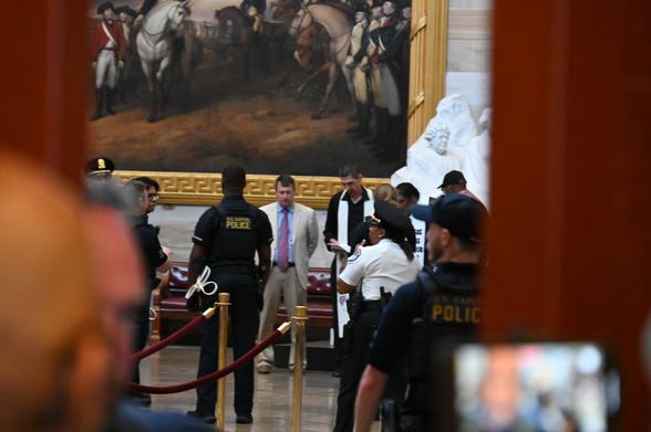 A photo of William Barber and clergy being arrested
