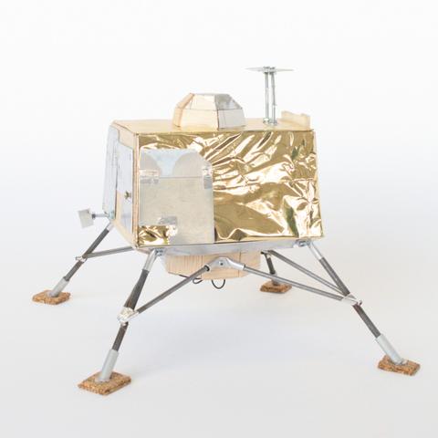 Sculpture by Aurel Porté inspired by the VIkram lunar lander. This piece employs poor or unsuitable materials for their purpose, evoking a vision of space exploration marked by a nuanced social reality, where a foreboding sense of tragedy (ecological, economic, migratory) has permeated the longing for elsewhere.