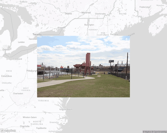 A photo of or from a park from the linked website, overlaid on a cropped world map where it's located.