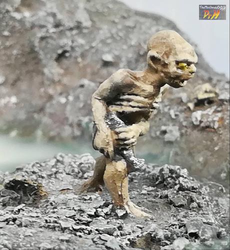 Close up of Gollum from the side.