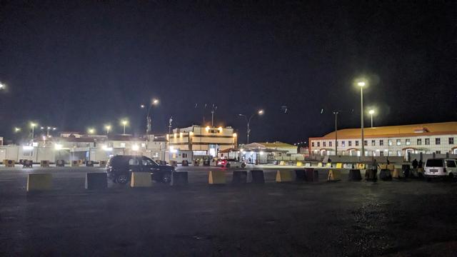 Parking lot in the border facilities at night time.