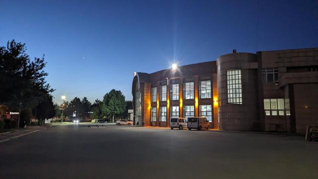 A bus terminal in dawn.