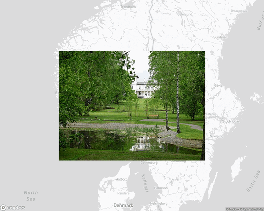 A photo of or from a park from the linked website, overlaid on a cropped world map where it's located.