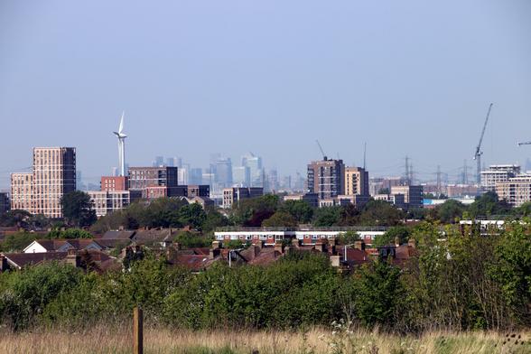 Detail of the previous image showing new residential mid-rise developments with the towers of Docklands, hazy with distance, showing in the gaps.
