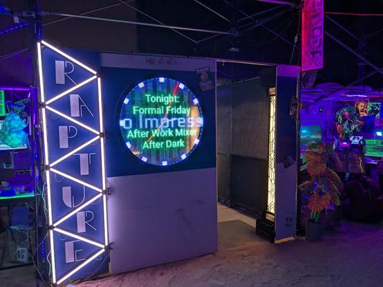 Frontage featuring a vertical sign with the name "RAPTURE" and window with LEDs saying "Tonight: Formal Friday (Dress to Impress) After Work Mixer After Dark"