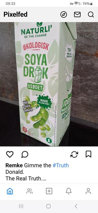 An upright container of soy milk saying usødet which means unsweetened.