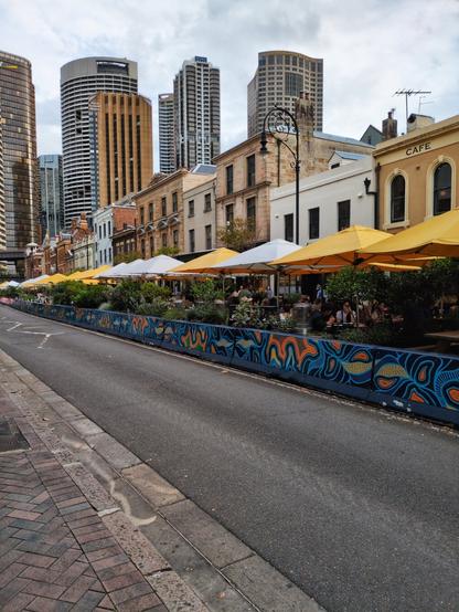 Cafés line the street opposite the Museum of Contemporary Art.