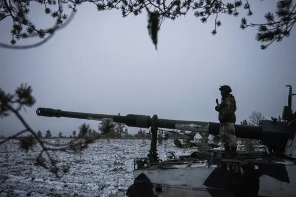 A Finnish soldier of the Karelia Brigade, one of the three Finnish Army readiness brigades, operates the K9 artillery during the NATO Exercise Dynamic Front, in 2024, near Rovaniemi, Lapland