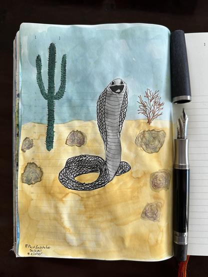 Sketch in sketchbook of slithering snake in a desert