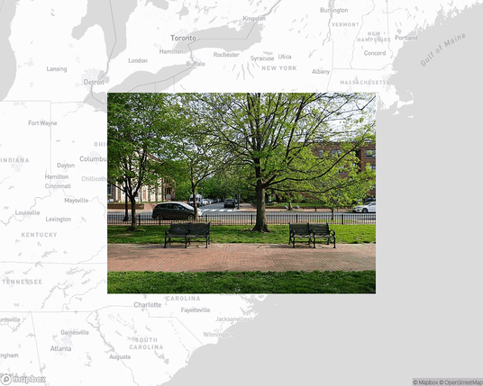 A photo of or from a park from the linked website, overlaid on a cropped world map where it's located.