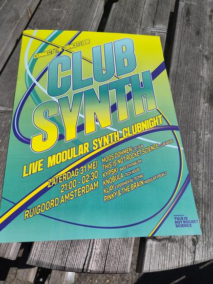 Picture of a poster 
Bright yellow and blue green colours 
Big letters saying CLUBSYNTH 
Connect the dancefloor 
Live modular synth clubnight
Zaterdag 31 mei 21:00 - 02:30 Ruigoord Amsterdam