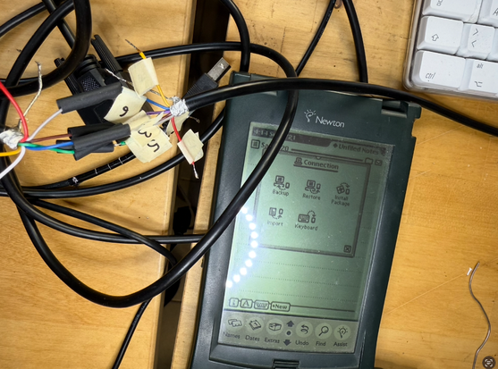The Apple Newton showing as "Connected" via the butchered cable, connedcted via a KeySpan 28X to a OSX Tiger machine running NCX 1.9