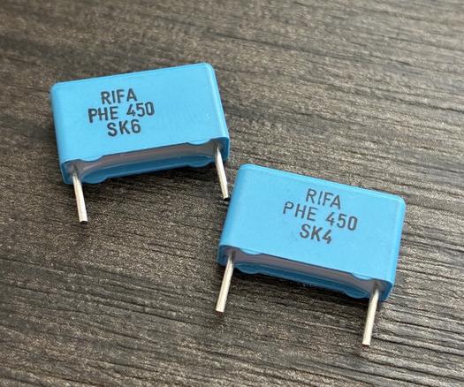 Two 450V blue RIFA branded security capacitors.