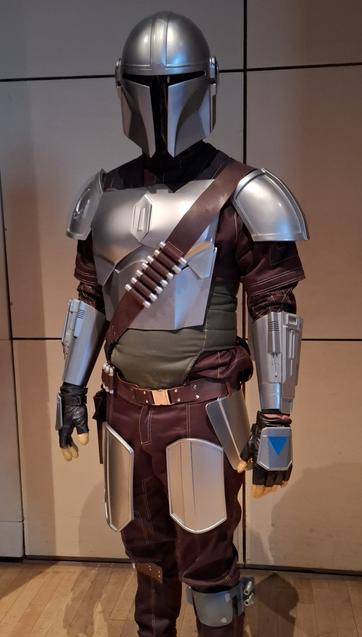 Me in a Mandalorian cosplay with friends