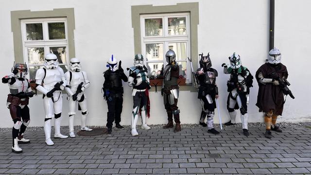 Me in a Mandalorian cosplay with friends.
