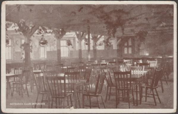 Printed sepia postcard showing a view of the interior of the Aotearoa Club at Codford Camp in Wiltshire. The club was created for the New Zealand troops stationed at the camp in the First World War.

Published by The Aotearoa Club, not numbered, c.1916.

Postally unused, but with partial message.

Fair condition, with noticeable corner bumps and light creasing to both top corners.