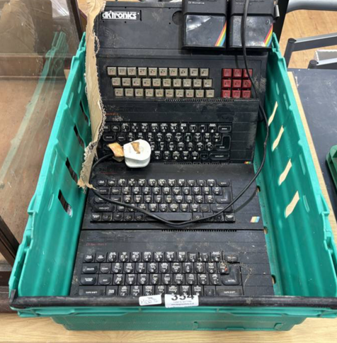 Crate of Sinclair spectrum computers and also an interesting dktronics keyboard