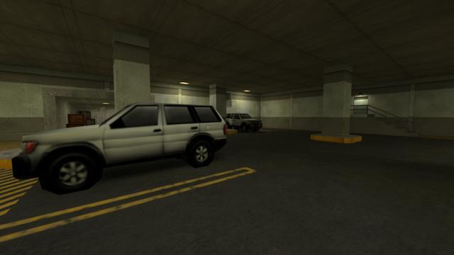 In this picture you can see the perspectives to the right of the second white SUV from the previous picture. From left to right you can see a white SUV, behind it is a pillar, behind it is the entrance/exit, where you can see light and dark brown wooden boxes. Further on you can see a pillar, the first white SUV, where above it on the wall is the open ventilation shaft, another column and the stairs leading to the door. Furthermore, you can see two yellow-lit lamps on the ceiling. This is on the map cs_siege in the game Counter-Strike 1.6.