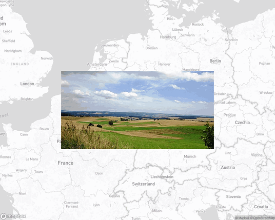 A photo of or from a park from the linked website, overlaid on a cropped world map where it's located.