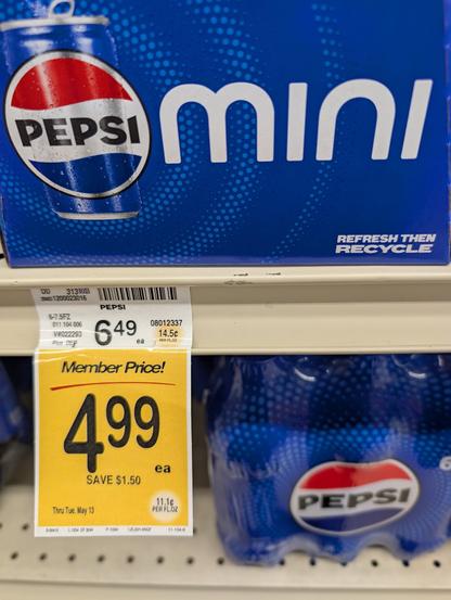 Shelf tag showing today's maximum price for an ounce of Pepsi, 14.5 cents per ounce if you don't use a loyalty card, and "only" 11.1 cents per ounce if you use the card.