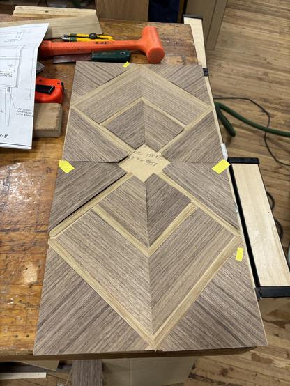 In the meantime I’m also working on the marquetry panel that’s going to be in the door. It’s a vaguely art deco design.