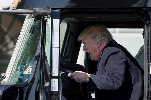 Trump in a truck. Is he makinging "vroom, vroom" noises?