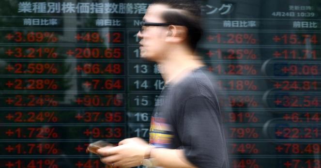 午前の日経平均は続伸、米中摩擦緩和を好感　中盤から見送り商状 | ロイター