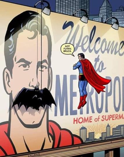 Comic book panel showing Superman floating in front of a huge billboard. It reads, "Welcome to Metropolis, Home of Superman" and has a huge picture of Superman's face on it.

Batman is hanging in front of Superman's image, with his cape spread out to look like a mustache on Superman.

The floating Superman says, "Not funny, Bruce."

(Art by Kerry Cullen.)