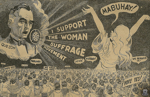 cartoon showing president Quezon saying "I support the woman suffrage movement" and women holding banners saying "vote yes!"